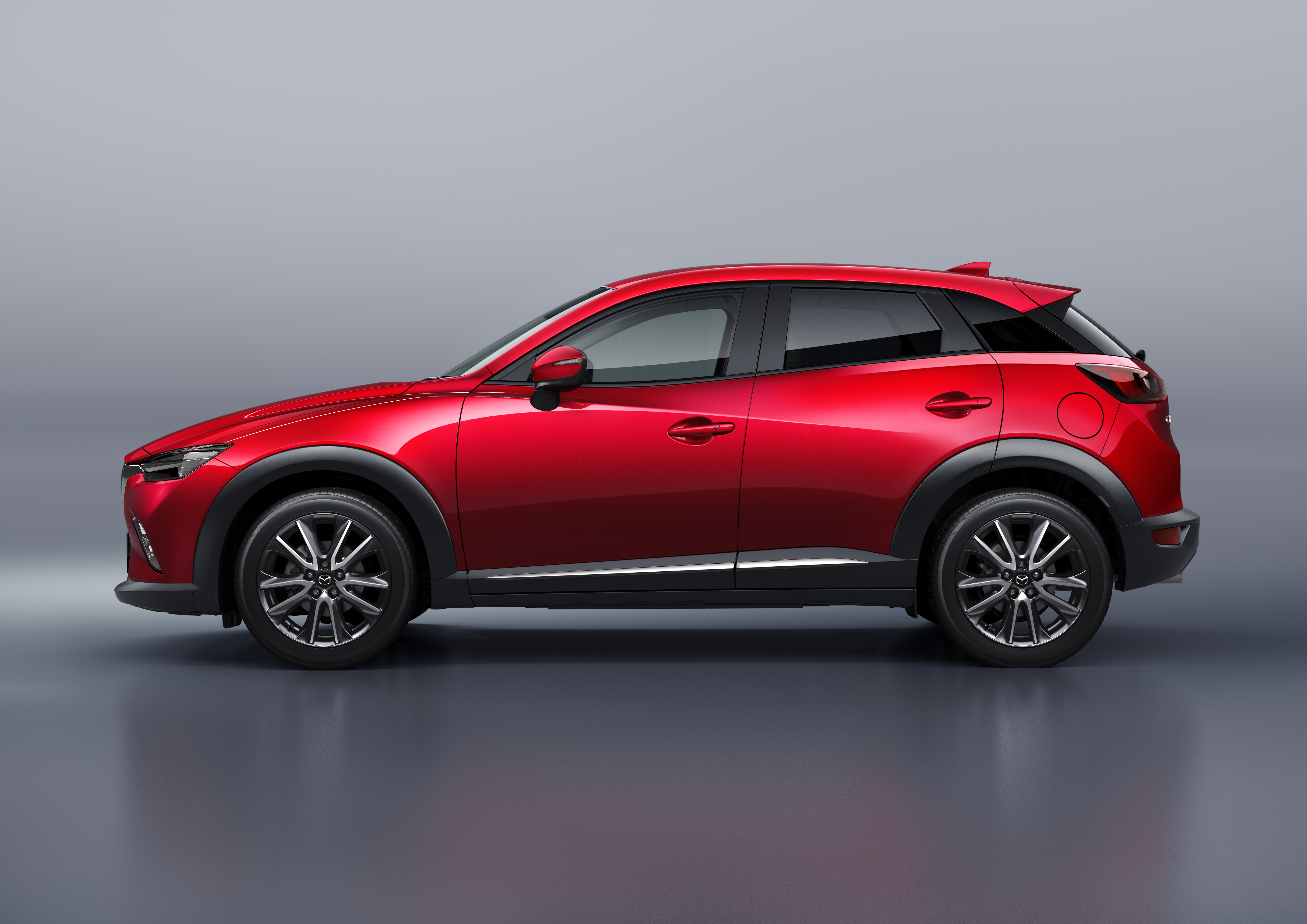 Три сх. Mazda CX-3. Мазда cx3 красная. Mazda CX-3 2015. Mazda CX 3 красная.