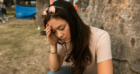 girl with head in her hands